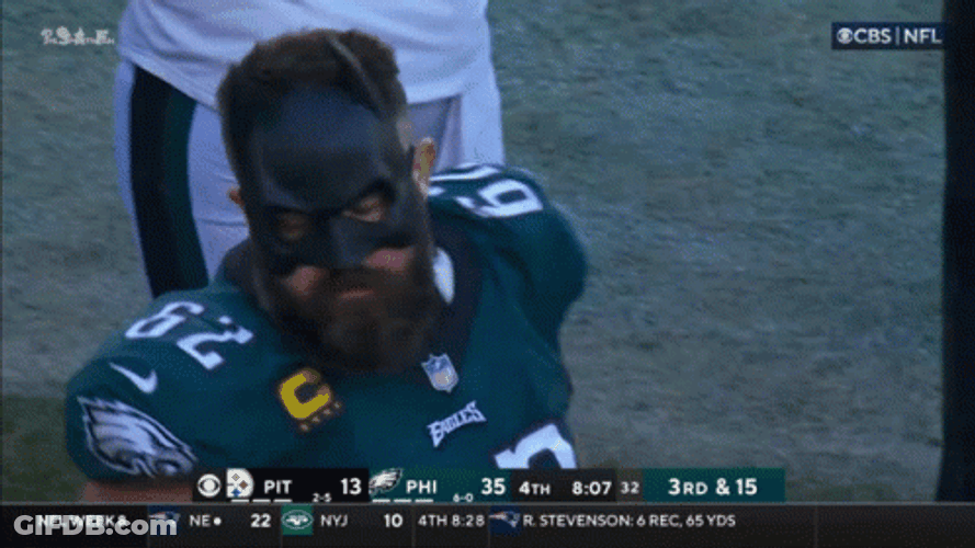 Jason Kelce Talking To Another Guy GIF