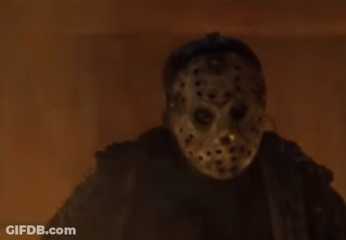 Jason Voorhees In Hockey Mask By Fire GIF