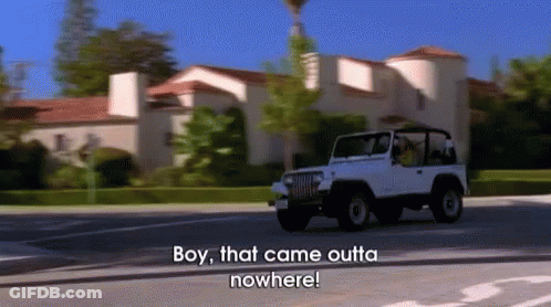 Jeep Driving Down Street Saying Boy That Came Outta Nowhere GIF