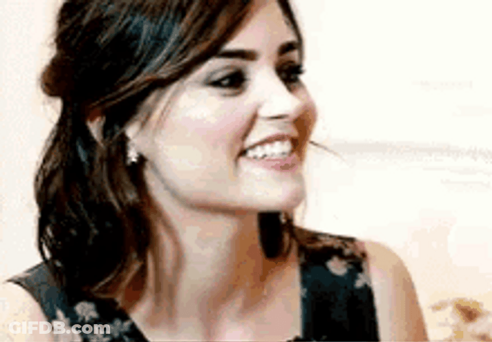 Jenna Coleman Shaking Her Hair GIF