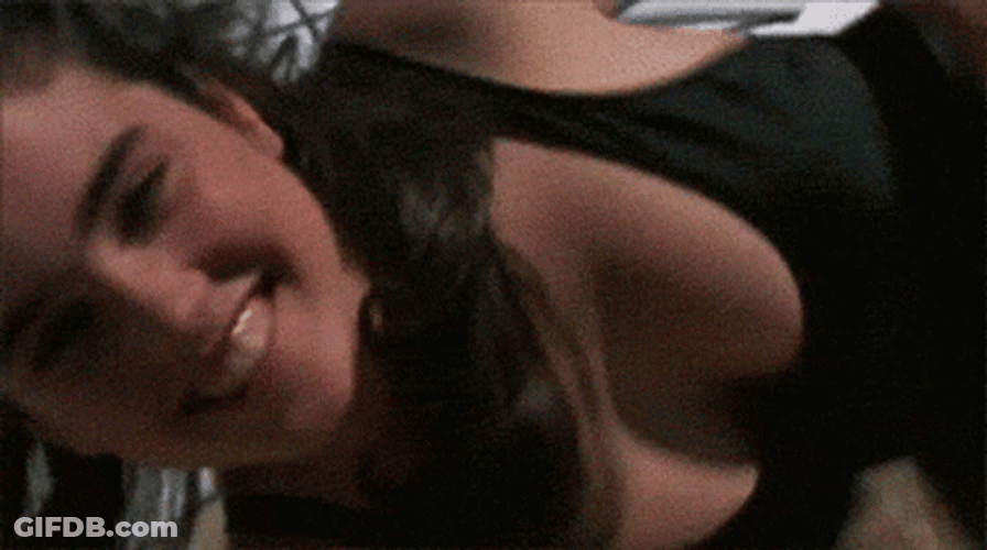 Jennifer Connelly Lying On The Beach GIF