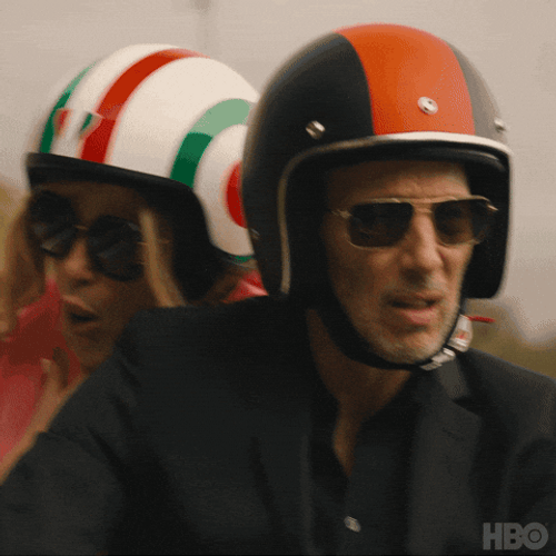 Jennifer Coolidge Getting Choked By Bike Helmet GIF