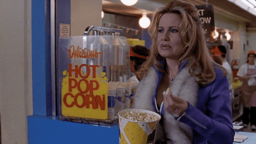 Jennifer Coolidge Holding A Bucket Of Popcorn GIF