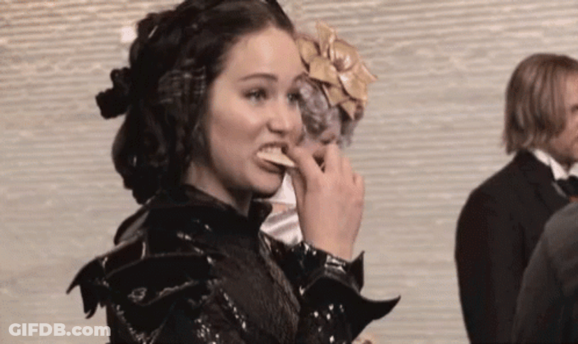 Jennifer Lawrence Eating On Hunger Games Set GIF