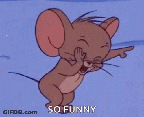 Jerry From Tom And Jerry Is Laughing And Pointing At The Camera . GIF