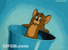 Jerry From Tom And Jerry Is Looking Out Of A Blue Cup GIF