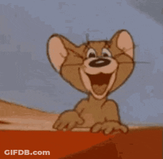 Jerry From Tom And Jerry Is Smiling And Pointing His Finger . GIF