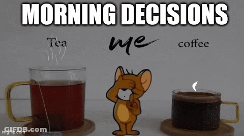 Jerry From Tom And Jerry Is Standing Between Two Cups Of Tea And A Cup Of Coffee . GIF