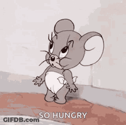 Jerry From Tom And Jerry Is Wearing A Diaper And Yawning With His Mouth Open . GIF