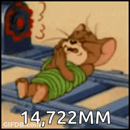 Jerry From Tom And Jerry Is Wrapped In A Green Striped Shirt And Laying On A Machine GIF