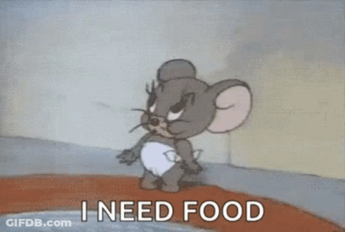 Jerry From Tom And Jerry Is Yawning With The Words I Need Food Below Him GIF