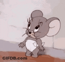 Jerry From Tom And Jerry Standing Next To Wall GIF