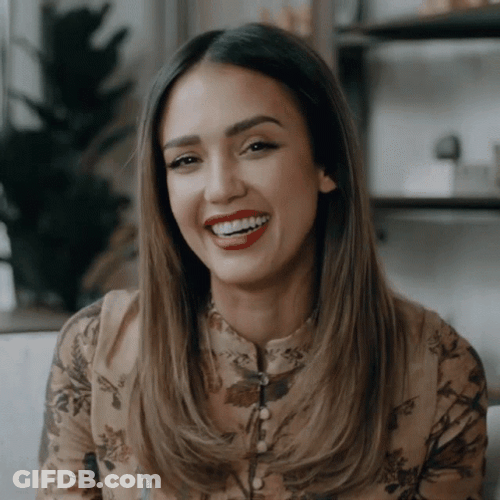 Jessica Alba Giggles While Holding Hair GIF