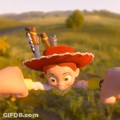 Jessie From Toy Story Held By Two Hands GIF