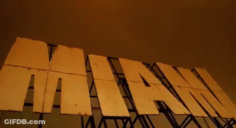Jet Flying Over Miami Sign GIF