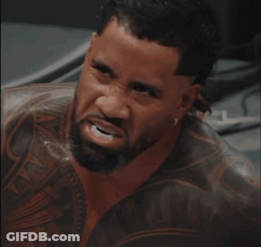Jey Uso Crouching Down GIF