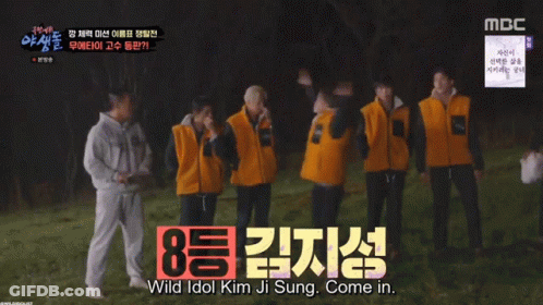 Ji Sung Moving Quickly In Front Of Group GIF