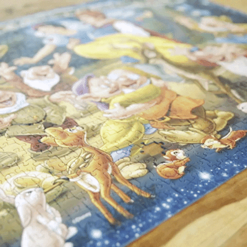 Jigsaw Puzzle Of Snow White And Seven Dwarves GIF