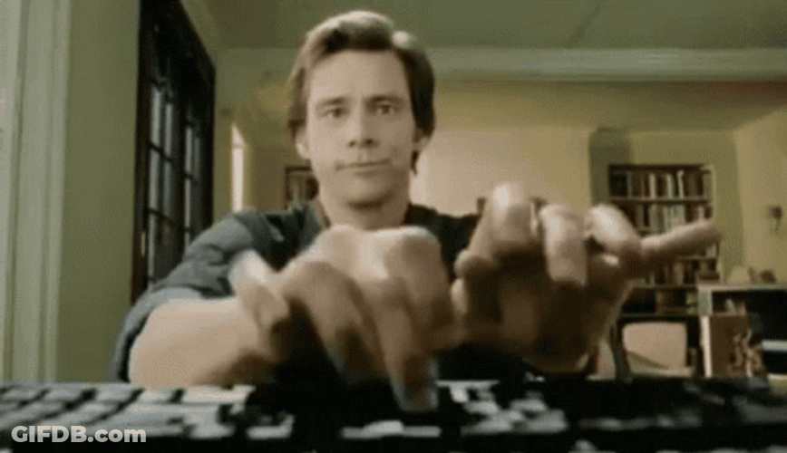 Jim Carey Emotionless Typing Fast GIF