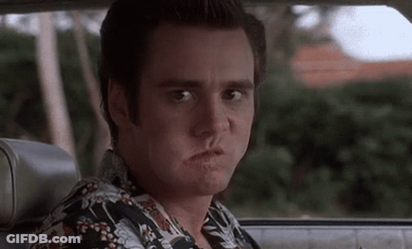 Jim Carrey Chewing Playful Face GIF