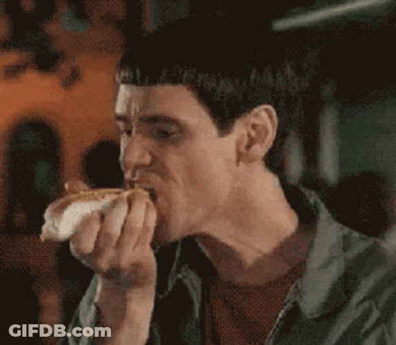 Jim Carrey Eating Sausage GIF