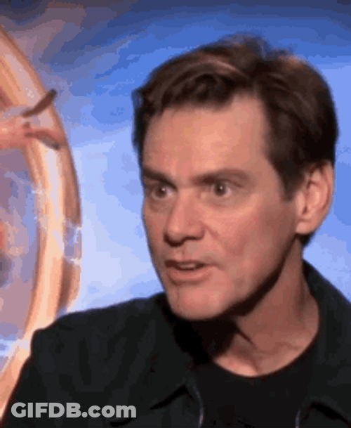 Jim Carrey Grinch Face GIF