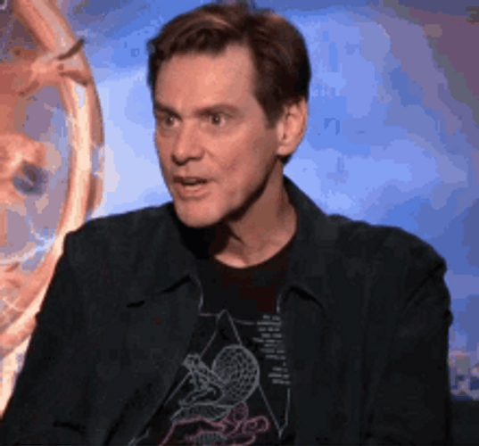Jim Carrey Interview Grinch Meme Smile GIF