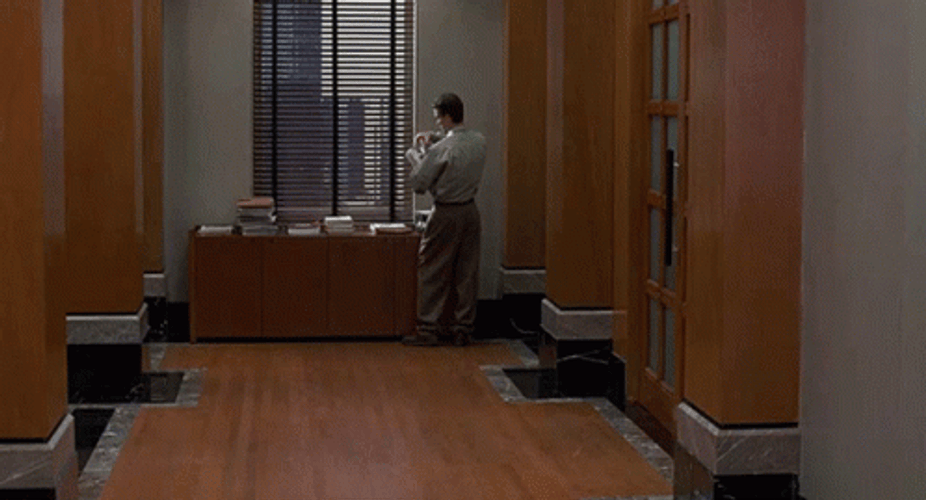 Jim Carrey Leaving Work Not Listening GIF