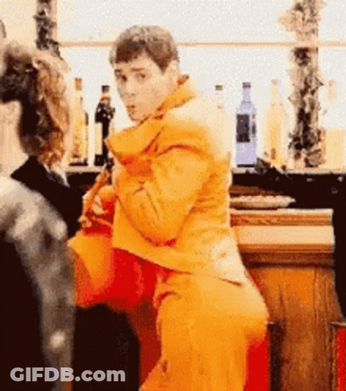 Jim Carrey Wearing Orange Suit GIF