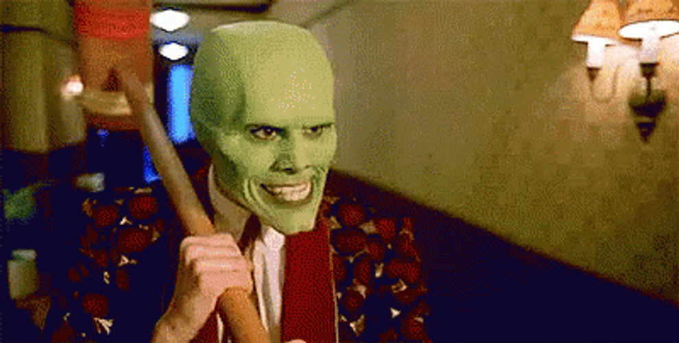 Jim Carrey With Mask Eyes Wide Shut GIF