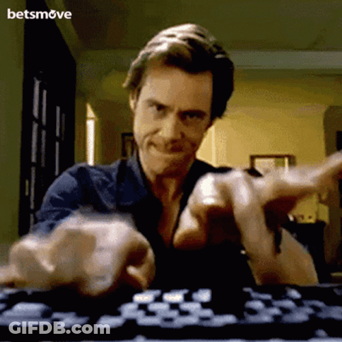 Jim Carrey Working Hard GIF