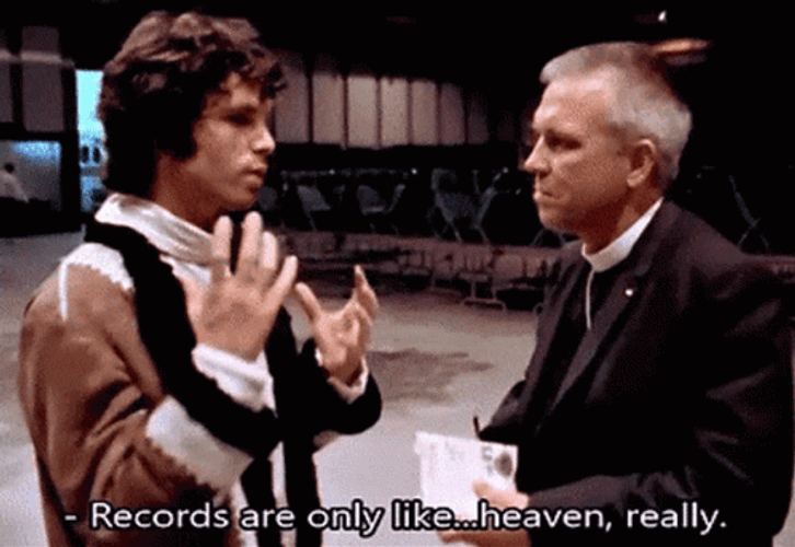 Jim Morrison Talking To A Man GIF