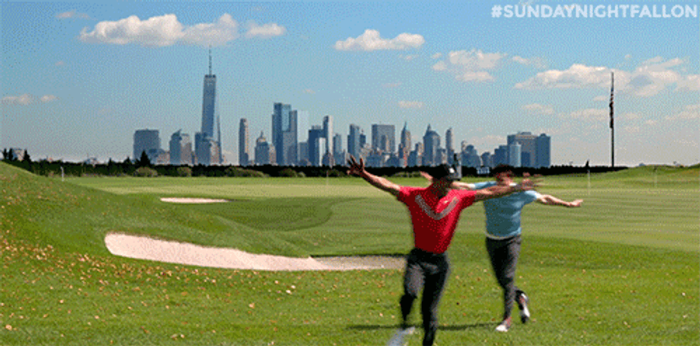 Jimmy Fallon Twirling In Golf Course GIF