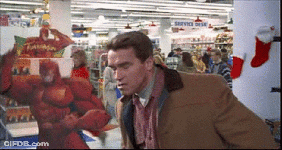 Jingle All The Way Arnold Schwarzenegger Got Hit GIF