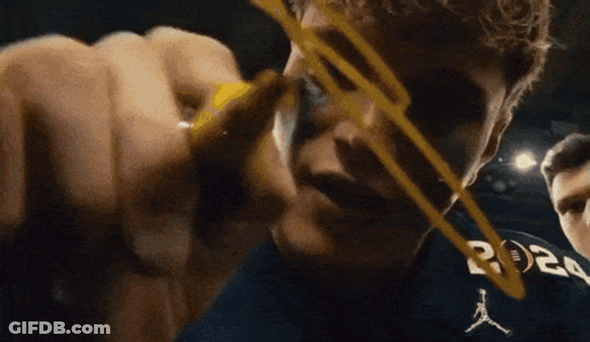 Jj Mccarthy Giving Autograph On Camera GIF