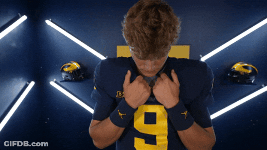 Jj Mccarthy Holding His Shirt Neckline GIF