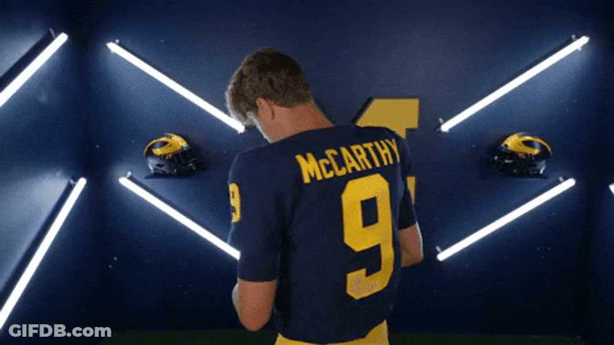 Jj Mccarthy Smiling While Holding Football GIF