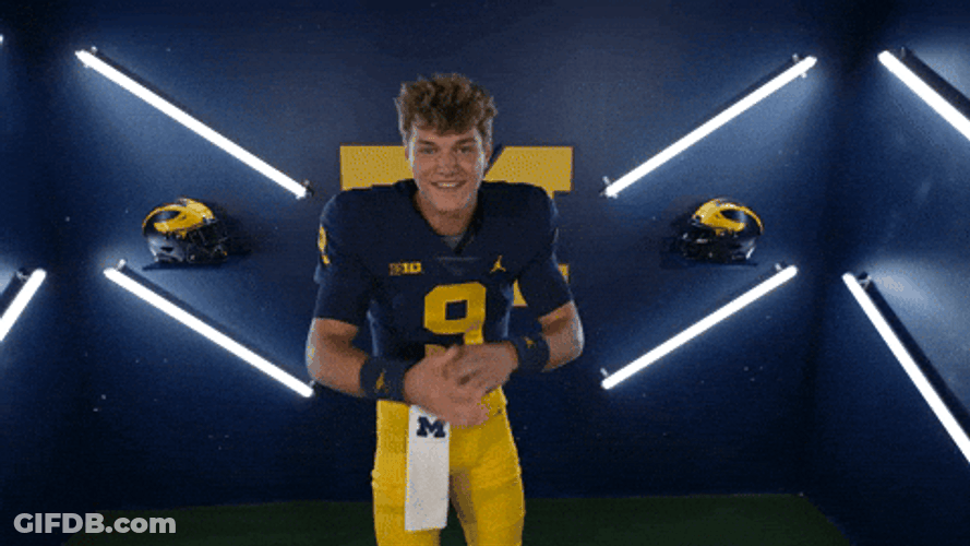 Jj Mccarthy Waving Hands Upwards GIF