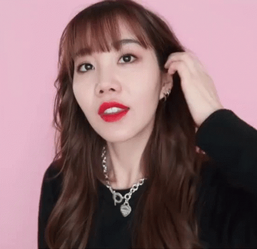 Joan Kim Demure Hair Tuck GIF
