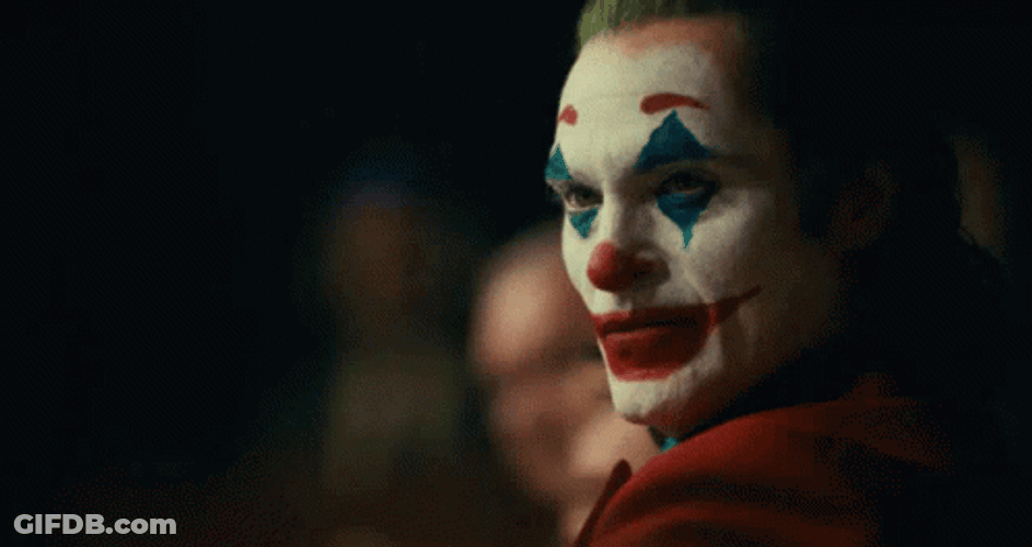 Joaquin Phoenix Joker Evil Grin GIF