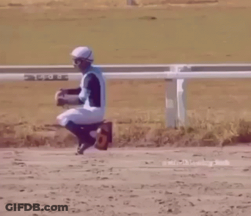 Jockey Jumping Over Fence GIF
