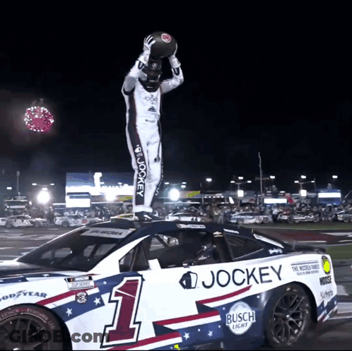 Jockey Race Car With Man Standing On Top GIF