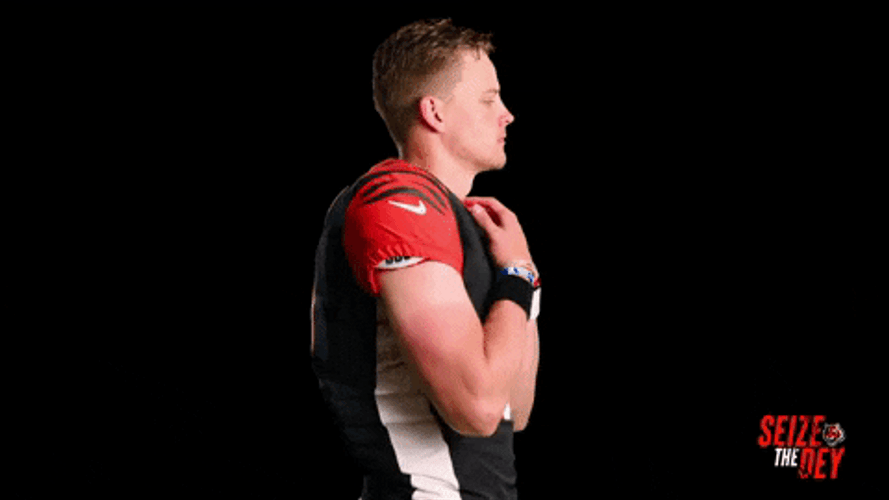 Joe Burrow Holding Jersey GIF