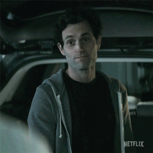 Joe Goldberg Shaking Head Smile GIF