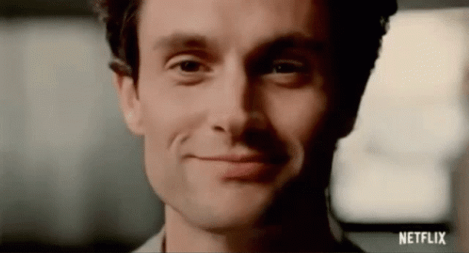 Joe Goldberg Smile Serious Face GIF