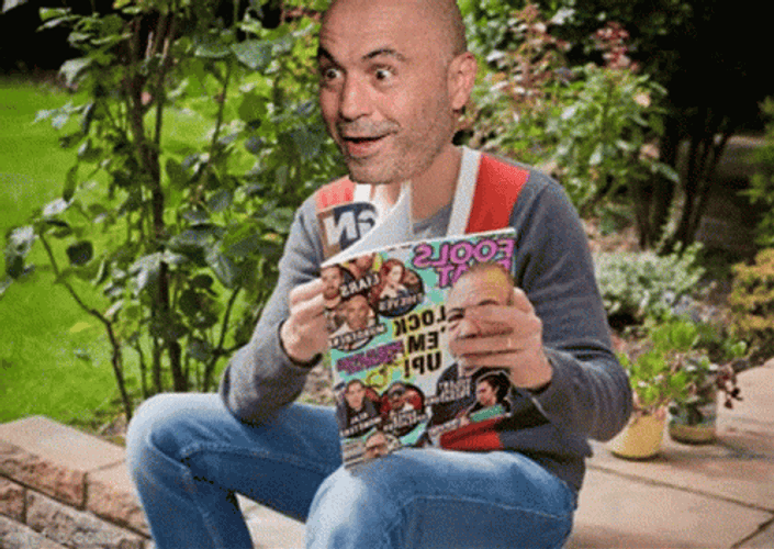 Joe Rogan Reading Comics GIF