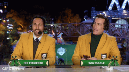 Joe Tessitore And Rob Riggle At Podium GIF