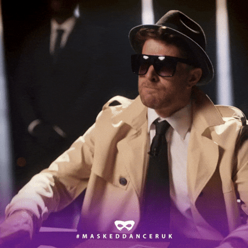 Joel Dommett Looking For Clue Magnifying Glass GIF