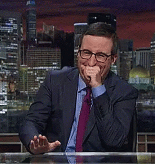 John Oliver Bursting Hysterical Laughing GIF
