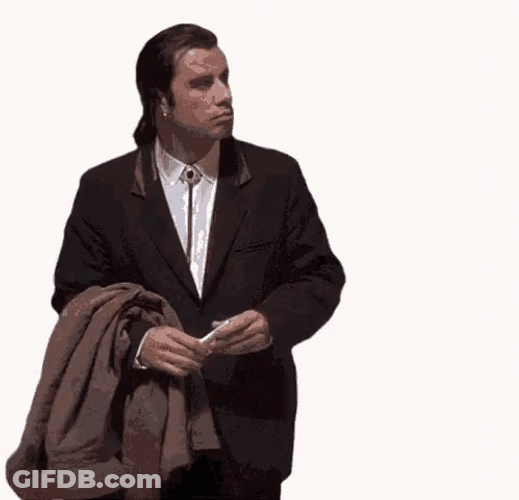 John Travolta Holding Sweater GIF